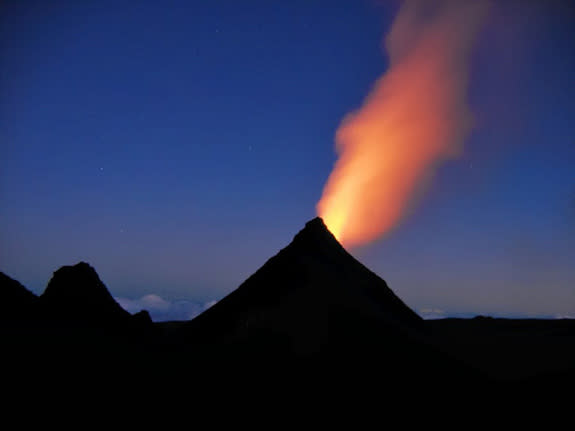 A monogenetic volcano erupts on the flank of Piton de la Fournaise on the French island of Réunion in July 2006.