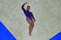 <p>USA's Jordan Chiles competes in the floor event of the artistic gymnastic women's qualification during the Tokyo 2020 Olympic Games at the Ariake Gymnastics Centre in Tokyo on July 25, 2021. (Photo by Antonin THUILLIER / AFP) (Photo by ANTONIN THUILLIER/AFP via Getty Images)</p> 