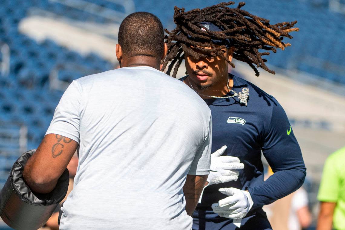 Seattle Seahawks defensive end Darryl Johnson (40) works through drills prior to the start of an NFL game on Sunday, Sept. 25, 2022, at Lumen Field in Seattle.