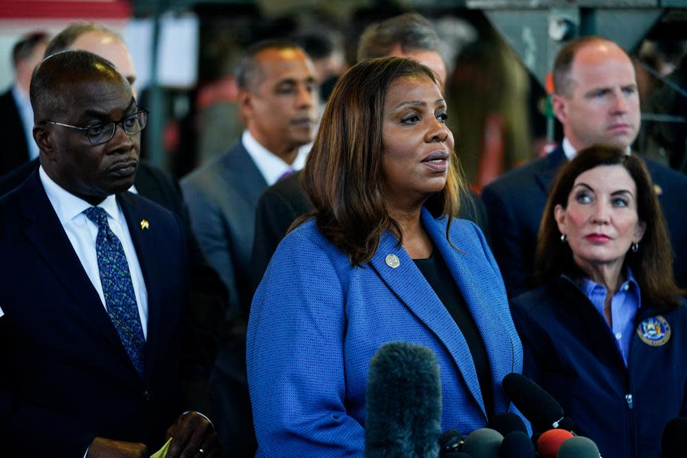 New York Attorney General Letitia James, center, accompanied by Buffalo Mayor Byron Brown, left, New York Gov. Kathy Hochul, right, and other officials, speaks with members of the media during a news conference near the scene of a shooting at a supermarket, in Buffalo, N.Y., May 15, 2022. (AP Photo/Matt Rourke, File)