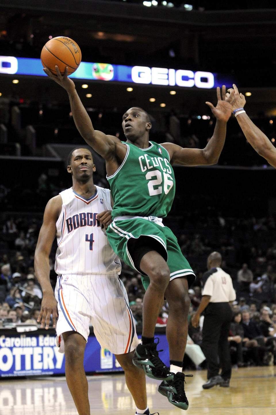 December 1, 2009; Charlotte, NC, USA; Boston Celtics guard Lester Hudson (26) shoots a lay-up against the <a class="link " href="https://sports.yahoo.com/nba/teams/charlotte/" data-i13n="sec:content-canvas;subsec:anchor_text;elm:context_link" data-ylk="slk:Charlotte Bobcats;sec:content-canvas;subsec:anchor_text;elm:context_link;itc:0">Charlotte Bobcats</a> at Time Warner Cable Arena. Celtics win 108 to 90. Mandatory Credit: Sam Sharpe-USA TODAY Sports