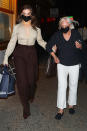 <p>Hailee Steinfeld walks arm-in-arm with her grandmother after grabbing dinner together at Carbone in N.Y.C. on Sept. 14. </p>