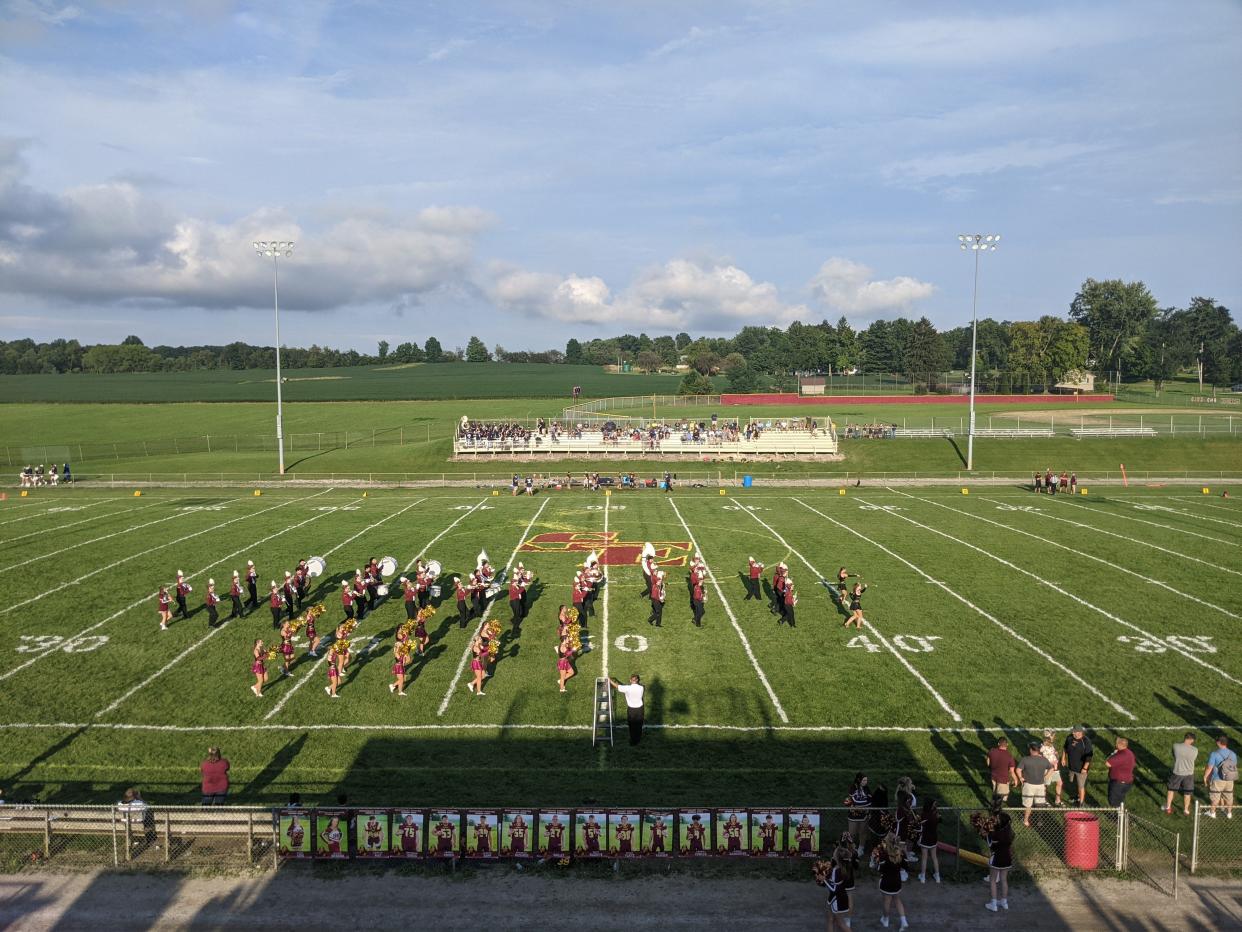 The Southeast band and cheerleaders perform at Freedom Field.