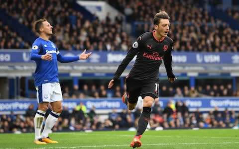 Mesut Ozil celebrates his goal - Credit: Getty images