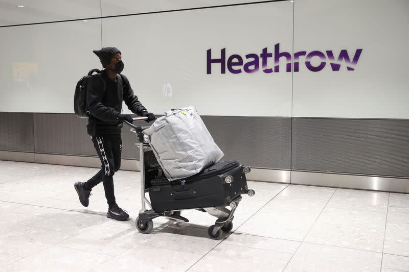 Britain introduces hotel quarantine programme for arrivals from a "red list" of 30 countries, in London