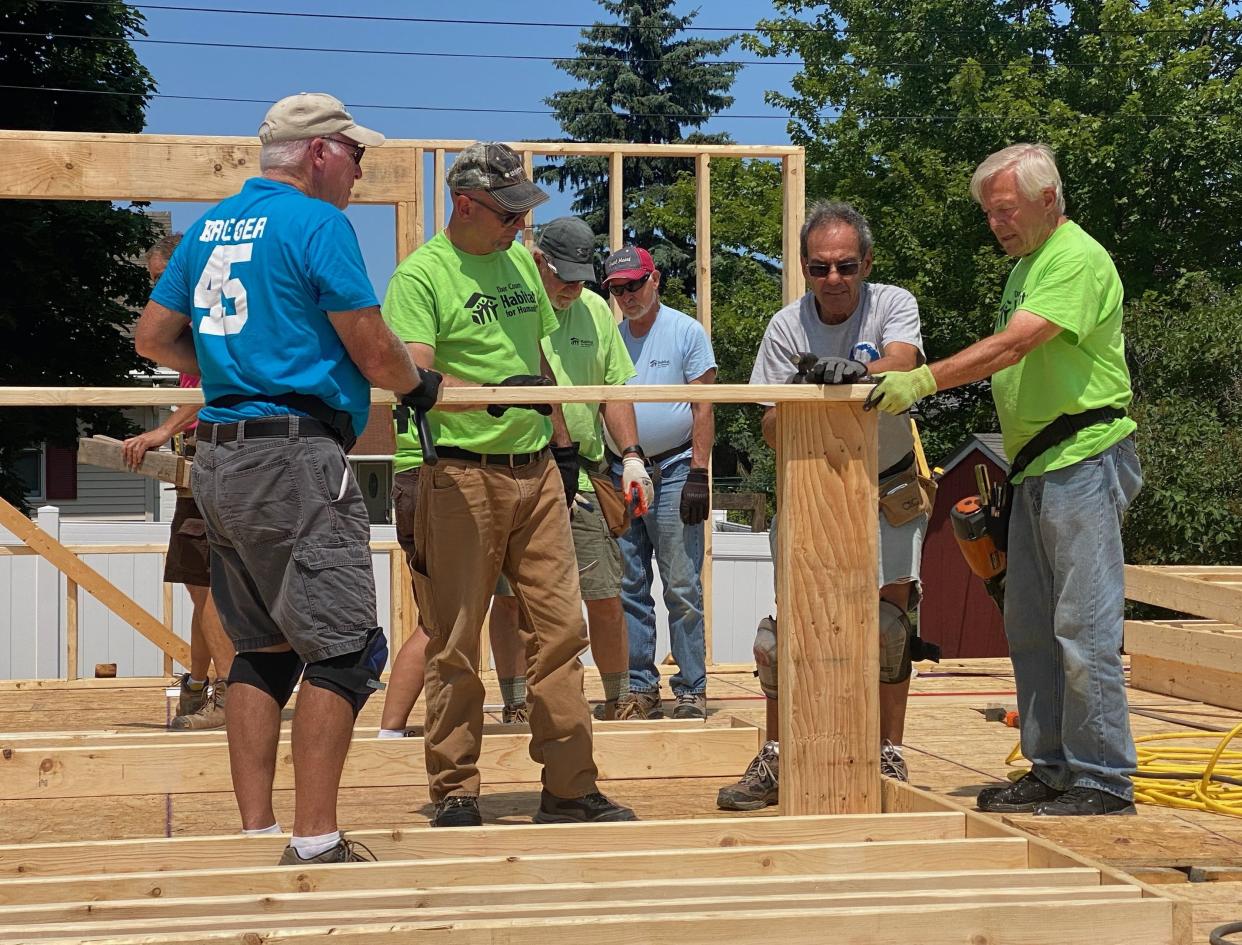 Volunteers work on building a Door County Habitat for Humanity home. The local organization announced it isn't building a new home for a family in 2024 largely because of rising costs and a lack of funds, the first time in its history it won't build.