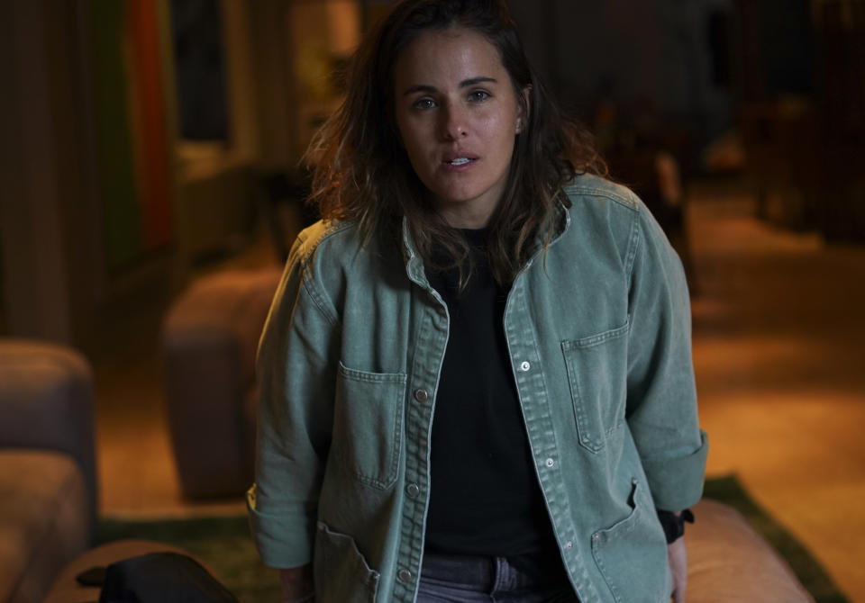 Saskia Niño de Rivera, a Mexican civil rights activist, poses for a photo at her apartment in Mexico City, Tuesday, Nov. 8, 2022. Niño de Rivera was excited about going to Qatar for a World Cup that would mark a significant professional event for her partner, a sports agent for Mexico soccer players, but as the lesbian couple learned more about laws against same-sex relations in the conservative Gulf country, she instead proposed at an Amsterdam stadium this summer and opted to skip the World Cup altogether. (AP Photo/Fernando Llano)