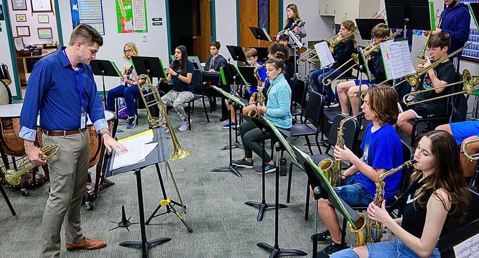 Andrew Burk, Valley Ridge Academy band director, works with students in his jazz band class at the school on Friday, Jan. 21, 2022. Burk is St. Johns County Teacher of the Year for 2022.