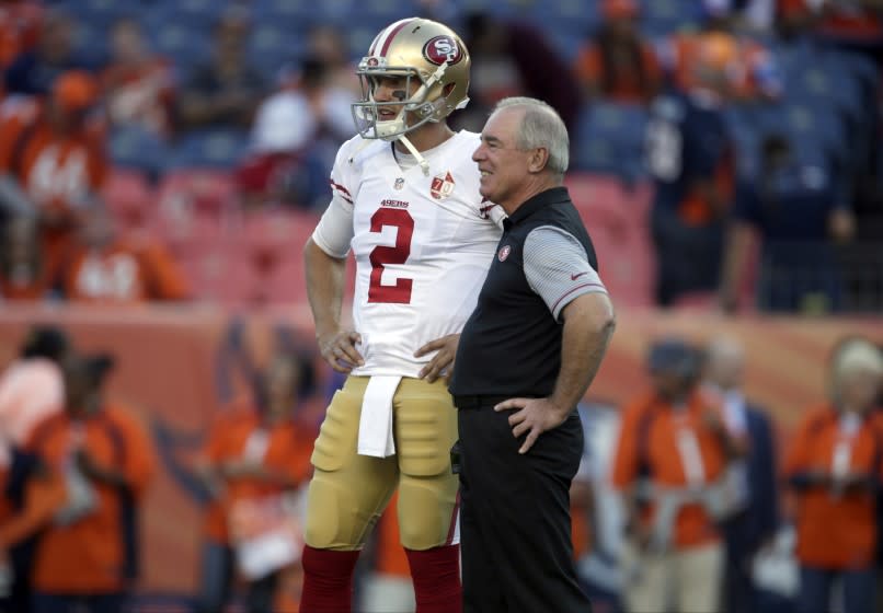 Dana Bible, then a senior advisor on San Francisco's staff, talks with quarterback Blaine Gabbert on Aug. 20, 2016.