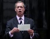 Leader of the Brexit Party Nigel Farage delivers a letter to Downing Street in London