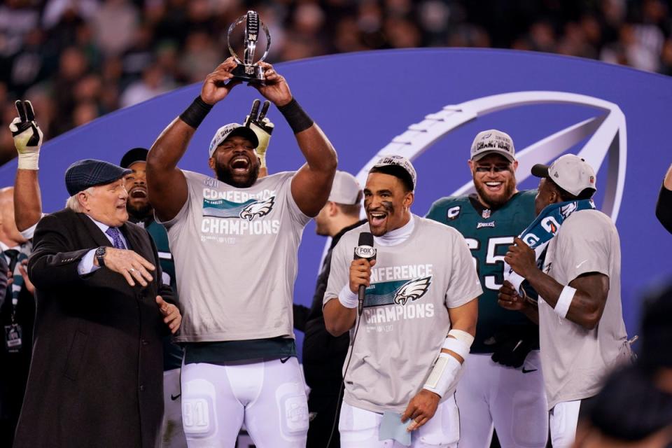 Philadelphia Eagles players celebrate the team’s win over the 49ers on Sunday (Associated Press)