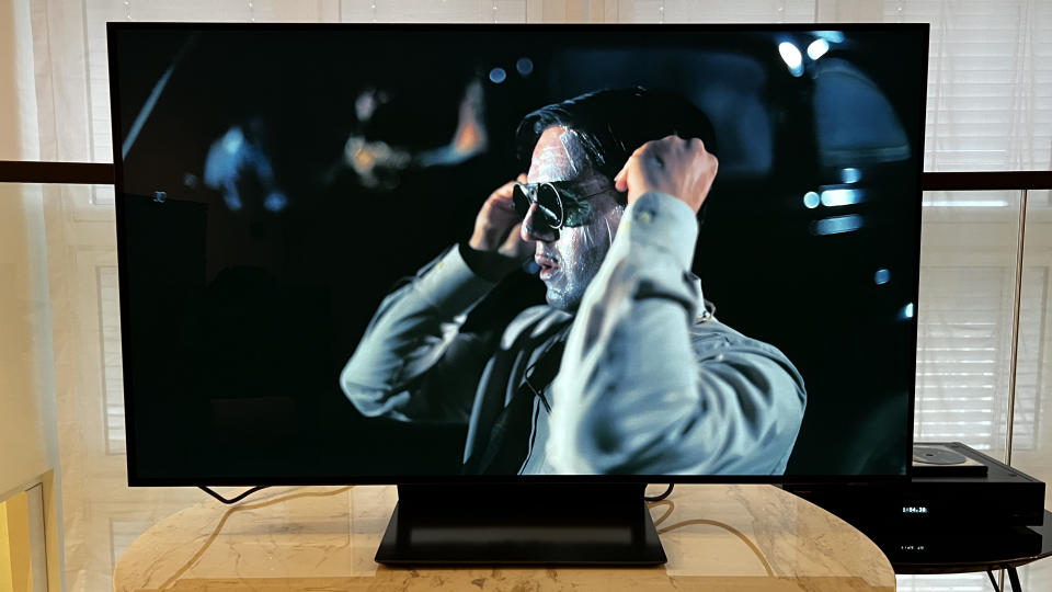 Samsung S90D 48-inch OLED TV on a wooden table