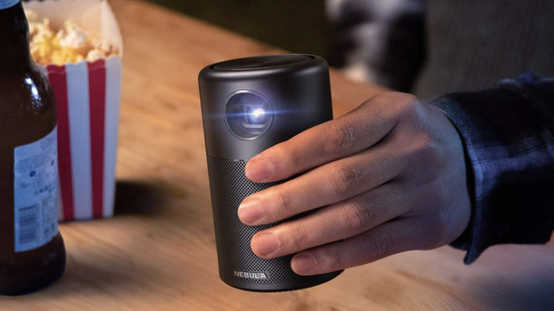  Anker nebula capsule portable projector in hand 