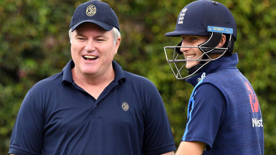 Stuart MacGill shares a laugh with England captain Joe Root.