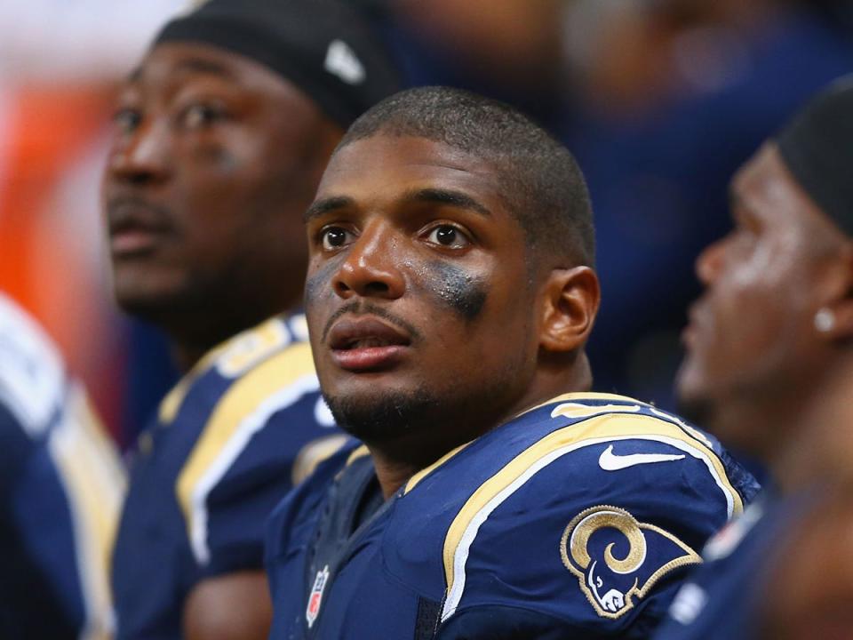 michael sam in uniform, looking up