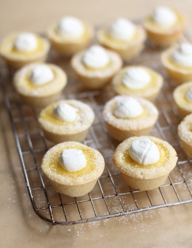 <p>Inquiring Chef</p><p>You’ll love these simple, fresh lemon tarts with no finicky crusts. Just bite-sized lemony-goodness with a sweet sugar cookie crust.</p><p><strong>Get the recipe: <a href="https://inquiringchef.com/sugar-cookie-lemon-tarts/" rel="nofollow noopener" target="_blank" data-ylk="slk:Sugar Cookie Lemon Tarts;elm:context_link;itc:0;sec:content-canvas" class="link rapid-noclick-resp"><em>Sugar Cookie Lemon Tarts</em></a></strong></p>