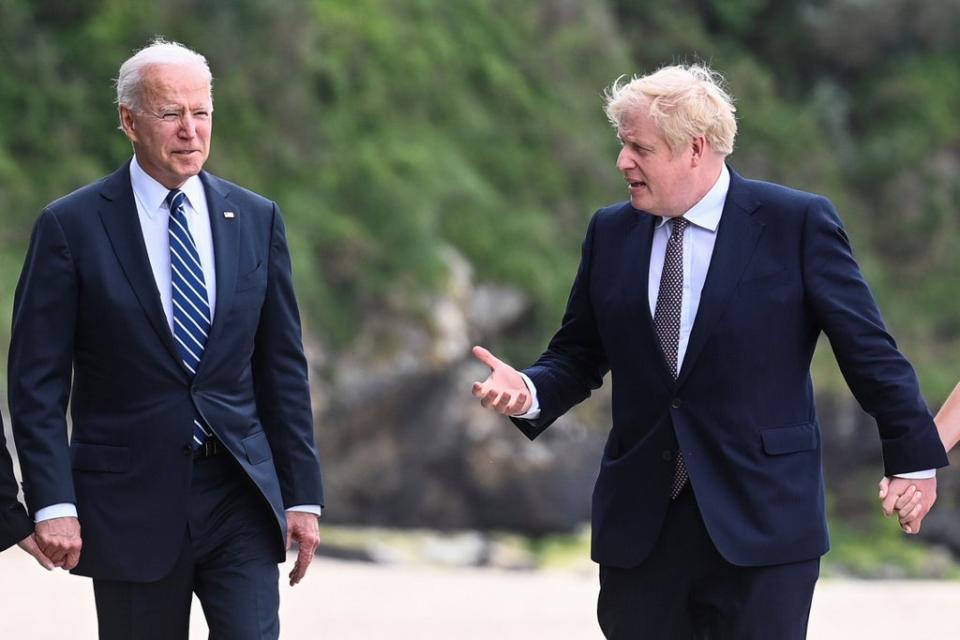 US President Joe Biden with Prime Minister Boris Johnson (PA)