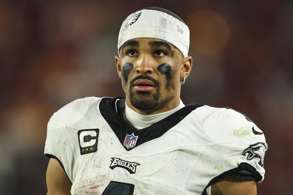 TAMPA, FL - JANUARY 15: Jalen Hurts #1 of the Philadelphia Eagles looks on from the sideline during an NFL Wild Card playoff football game against the Tampa Bay Buccaneers at Raymond James Stadium on January 15, 2024 in Tampa, Florida. (Photo by Perry Knotts/Getty Images)