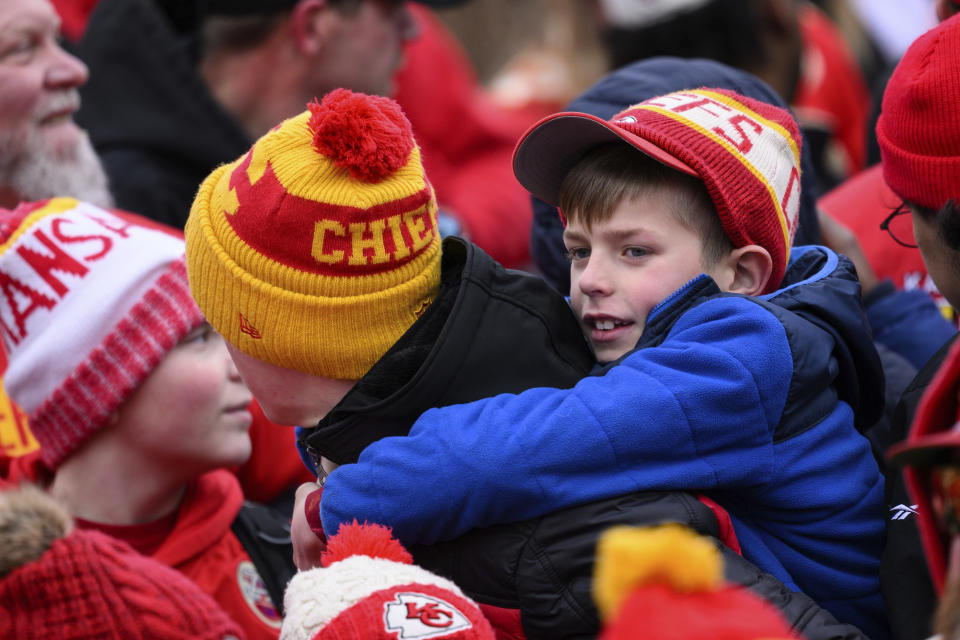 Fans gather for the Kansas City Chiefs' victory celebration and parade in Kansas City, Mo., Wednesday, Feb. 15, 2023, following the Chiefs' win over the Philadelphia Eagles Sunday in the NFL Super Bowl 57 football game. (AP Photo/Reed Hoffman)