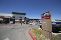 The El Centro Regional Medical Center is shown Wednesday, May 20, 2020, in El Centro, Calif. As much of California inches toward businesses reopening, this farming region on the state's border with Mexico is grappling with a spike in hospitalizations from the coronavirus that could inflict more pain on its perpetually struggling economy. (AP Photo/Gregory Bull)