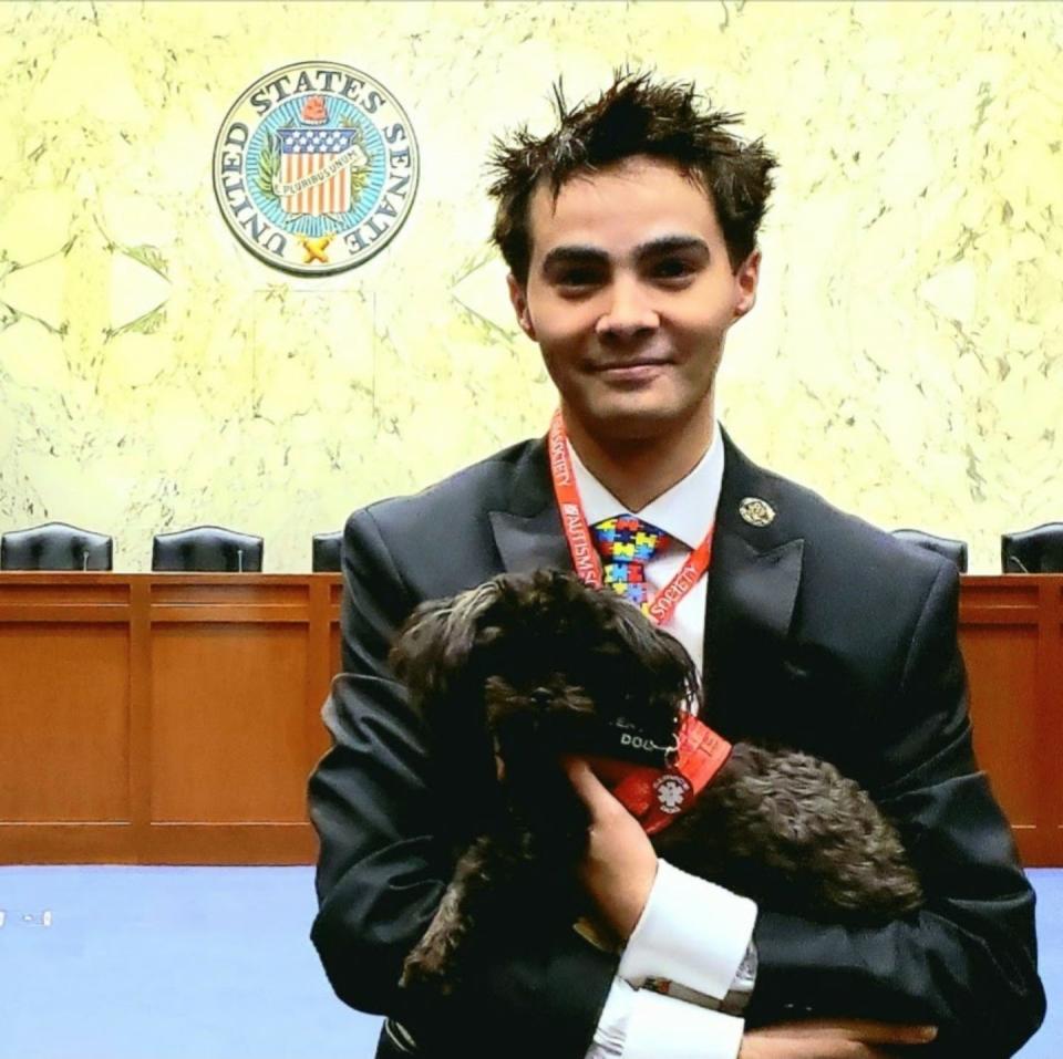 Alexander Kingston and his service dog met with U.S. senators on legislation related to disabilities.