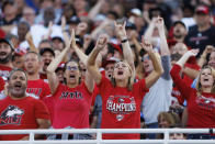 Northern Illinois fans cheer after a touchdown against Kentucky during the first half of an NCAA college football game in Lexington, Ky., Saturday, Sept. 24, 2022. (AP Photo/Michael Clubb)