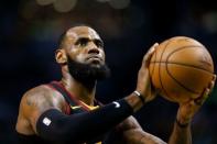 FILE PHOTO: May 23, 2018; Boston, MA, USA; Cleveland Cavaliers forward LeBron James (23) attempts a free throw against the Boston Celtics during the first quarter of game five of the Eastern conference finals of the 2018 NBA Playoffs at TD Garden. Mandatory Credit: Greg M. Cooper-USA TODAY Sports/File Photo