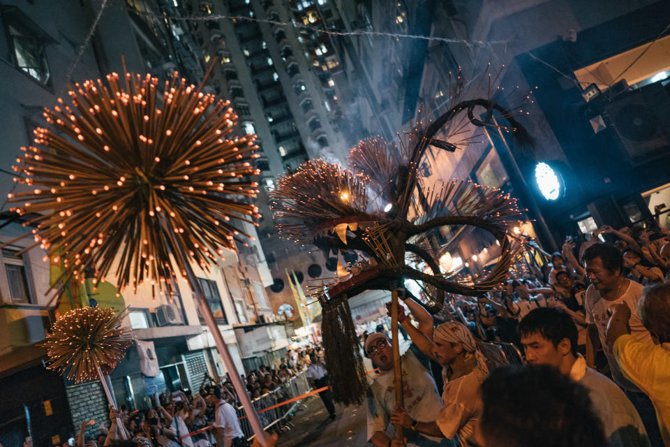 dance team performs the Fire Dragon Dance to celebrate the Mid-Autumn Festival in Hong Kong on Sept. 23, 2018.