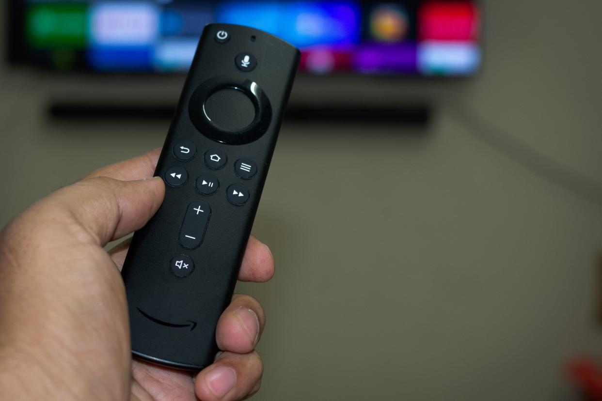 All the different <a href="https://amzn.to/35Ygh1z" target="_blank" rel="noopener noreferrer">Fire TV Sticks</a> let you control what&rsquo;s happening on the screen with Alexa and stream Netflix, Prime Video, Disney+, HBO, Apple TV and YouTube all from your TV. Plus, all three have more movies and TV episodes to choose from than what&rsquo;s usually on cable. (Photo: Homesh Nasre via Getty Images)