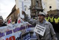 A protester yells slogans during a march against the government of Ecuador's President Rafael Correa in Quito, Ecuador, July 2, 2015. REUTERS/Guillermo Granja