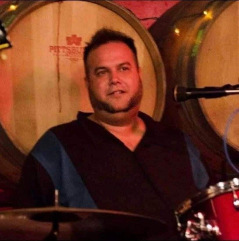 Andy Taravella seen in his common position, behind a drum kit, in this case at Pittsburgh Winery.