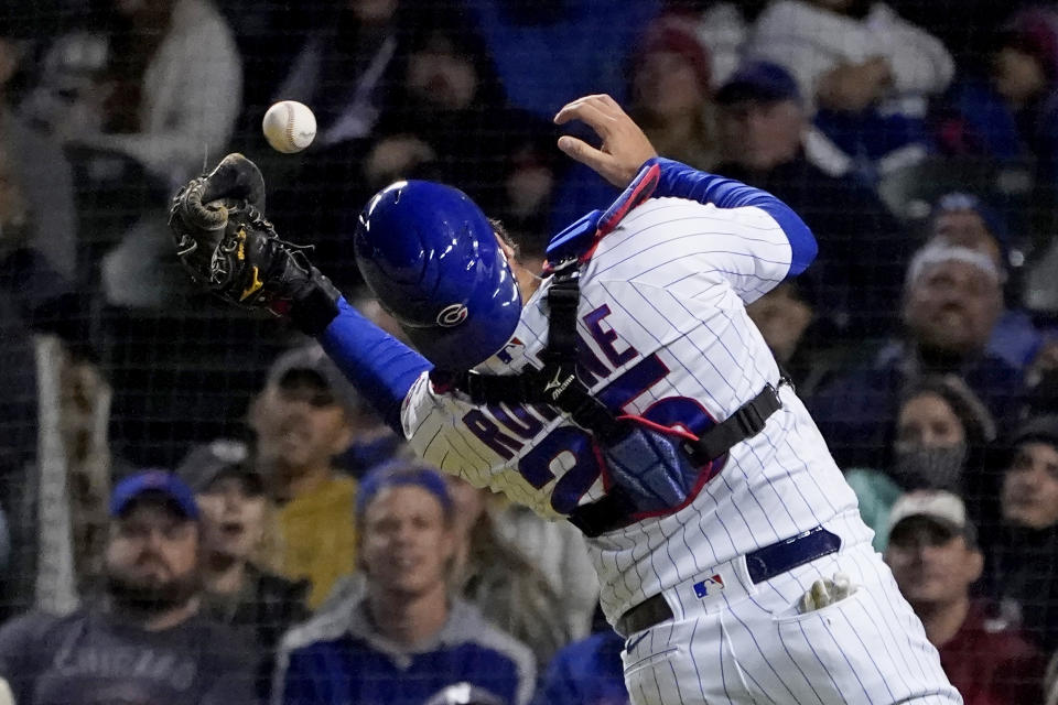 Chicago Cubs catcher Austin Romine catches Minnesota Twins' Josh Donaldson's pop up behind home plate during the eighth inning of a baseball game Wednesday, Sept. 22, 2021, in Chicago. (AP Photo/Charles Rex Arbogast)