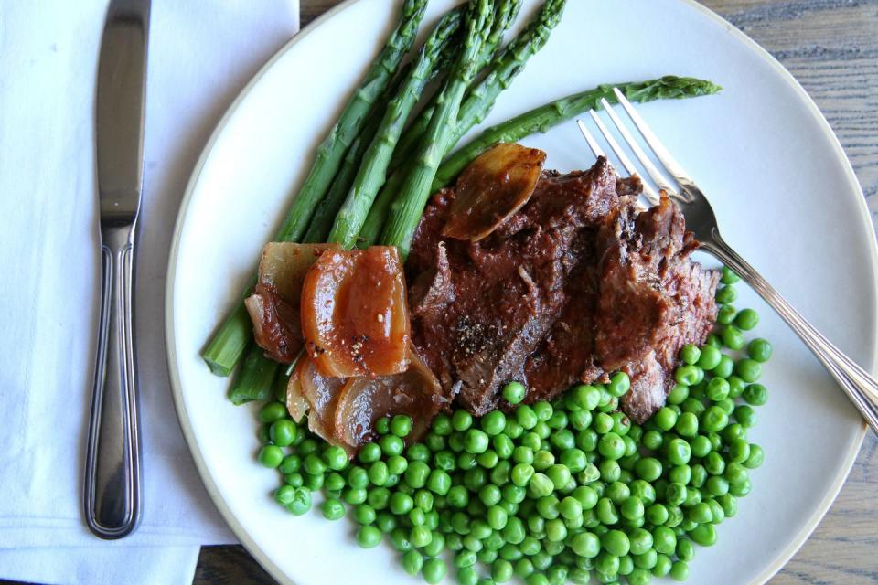 19) Slow-Cooker Pot Roast with Peas and Asparagus