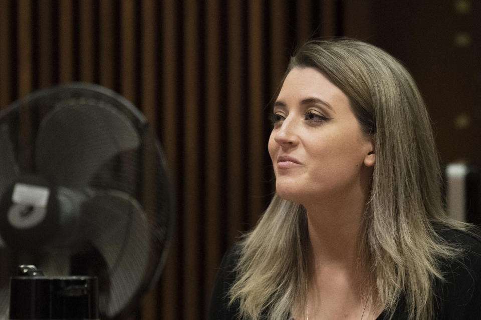 Kate McClure appears in court Monday, April 15, 2019 at Burlington County Superior Court in Mount Holly, N.J. McClure pleaded guilty to a state charge in a 'good Samaritan' scam of GoFundMe donors and faces a potential four-year prison term. (Joe Lamberti/Camden Courier-Post via AP, Pool)