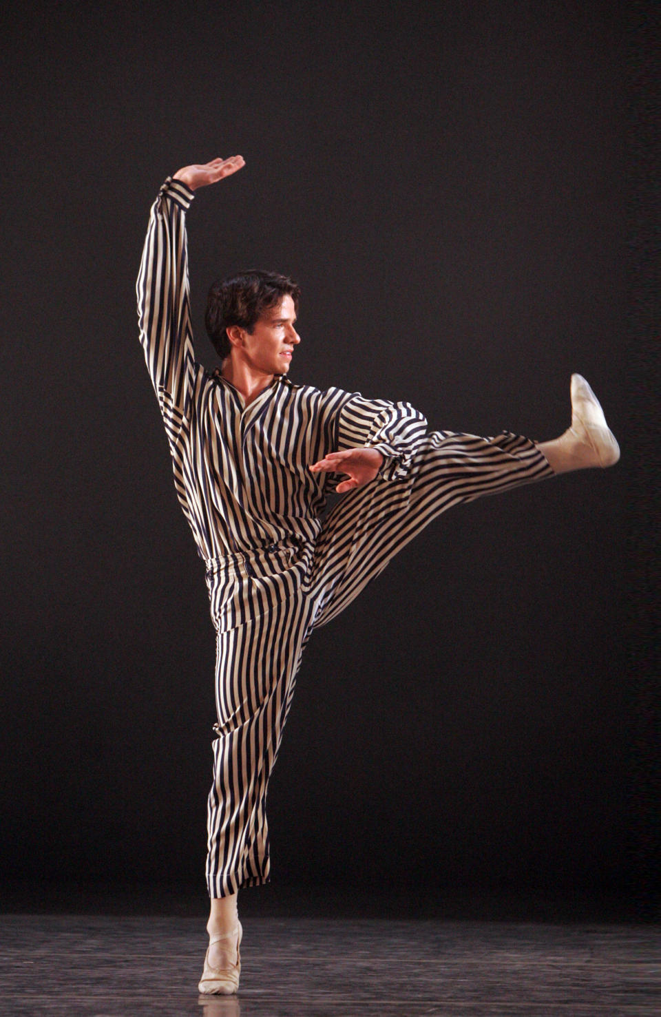 This 2012 photo released by the American Ballet Theatre shows Arron Scott in "In the Upper Room" in New York. (AP Photo/American Ballet Theatre, Rosalie O'Connor)