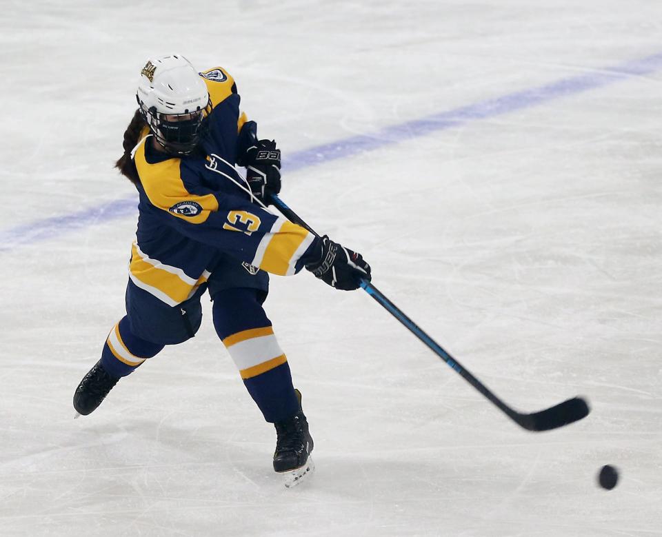 Notre Dame's Sarah Francis rips a shot from the blue line during first period action of their game against Marshfield at Hobomock Arena on Saturday, Feb. 6, 2021.