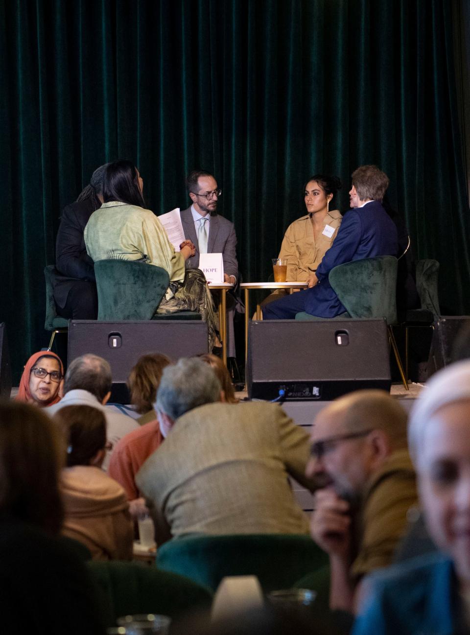 People are put into groups and converse during Millions of Conversations’ event Conversation of Grief, Healing and Hope, at AnzieBlue in Nashville, Tenn., Thursday, Oct. 26, 2023.