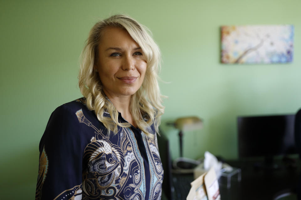 Katarina Maloney is pictured in her company’s offices in Carlsbad, Calif., on Aug. 27, 2019. Maloney is the CEO of Mathco Health Corporation, which sells products made with the cannabis extract CBD. Documents filed in a California court by a former employee, as well as interviews with two other former employees, link Maloney’s company to Yolo! brand CBD vape oil, a product that authorities blamed for sickening people in 2017 and 2018 because it was spiked with dangerous synthetic marijuana. Maloney said Mathco does not “engage in the manufacture, distribution or sale of any illegal products” and said the company can’t control what happens to products once they are shipped. (AP Photo/Gregory Bull)