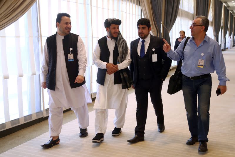 Members of Afghanistan's Taliban delegation are seen, ahead of an agreement signing between them and U.S. officials in Doha