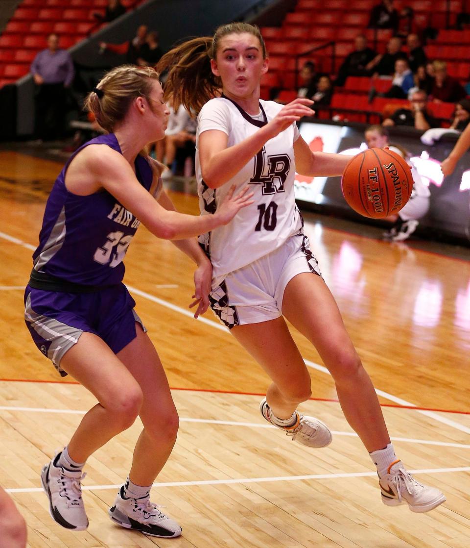 Logan Rogersville Lady Wildcat Hailey Buckman drives to the basket against Fair Grove in the 2nd round of the Pink Division during the Pink & White Tournament at O'Reilly Family Event Center on December 28th, 2023.