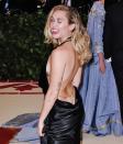 <p>It's no secret this <em>The Voice </em>judge loves a tribute tattoo. The word, <a href="http://www.popstartats.com/miley-cyrus-tattoos/arm-katz/" rel="nofollow noopener" target="_blank" data-ylk="slk:"KATZ" on the back of her arm;elm:context_link;itc:0;sec:content-canvas" class="link ">"KATZ" on the back of her arm</a> is for her BFF Katy Weaver. Katy also has a matching one, "MEOWTZ" on her right wrist. </p><p>She also has a heart with the initials "WA" in it. Though she has yet to publicly reveal what it stands for, according to <a href="http://www.popstartats.com/miley-cyrus-tattoos/arm-moo-leetle-wa/" rel="nofollow noopener" target="_blank" data-ylk="slk:Pop Star Tat;elm:context_link;itc:0;sec:content-canvas" class="link ">Pop Star Tat</a>, many believe it's a tat to honor Woody Allen.</p>