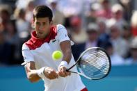 Tennis - ATP 500 - Fever-Tree Championships - The Queen's Club, London, Britain - June 21, 2018 Serbia's Novak Djokovic in action during his second round match against Bulgaria's Grigor Dimitrov Action Images via Reuters/Tony O'Brien