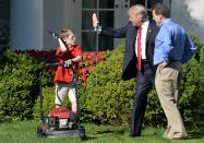 <p>President Donald Trump high fives Frank Giaccio, 11, of Falls Church, Virginia, as he mows the lawn in the Rose Garden of the White House on September 15, 2017, in Washington, DC.<br> Giaccio, who has his own lawn mowing business wrote a letter to the President asking if he could mow the lawn at the White House. (Photo: Mike Theiler/AFP/Getty Images) </p>