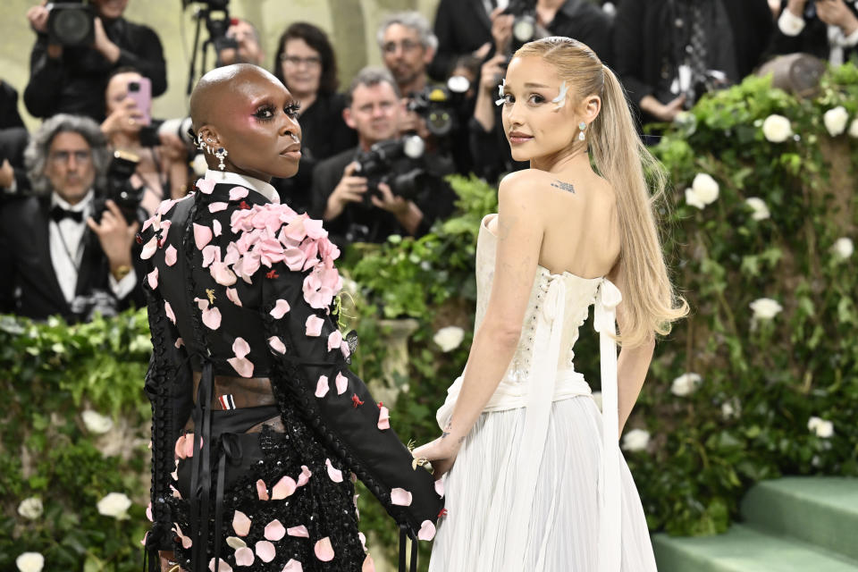 Cynthia Erivo, left, and Ariana Grande attend The Metropolitan Museum of Art's Costume Institute benefit gala celebrating the opening of the "Sleeping Beauties: Reawakening Fashion" exhibition on Monday, May 6, 2024, in New York. (Photo by Evan Agostini/Invision/AP)