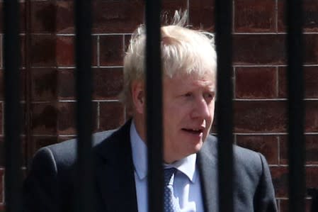 Britain's Prime Minister Boris Johnson is seen at the back of Downing Street in London