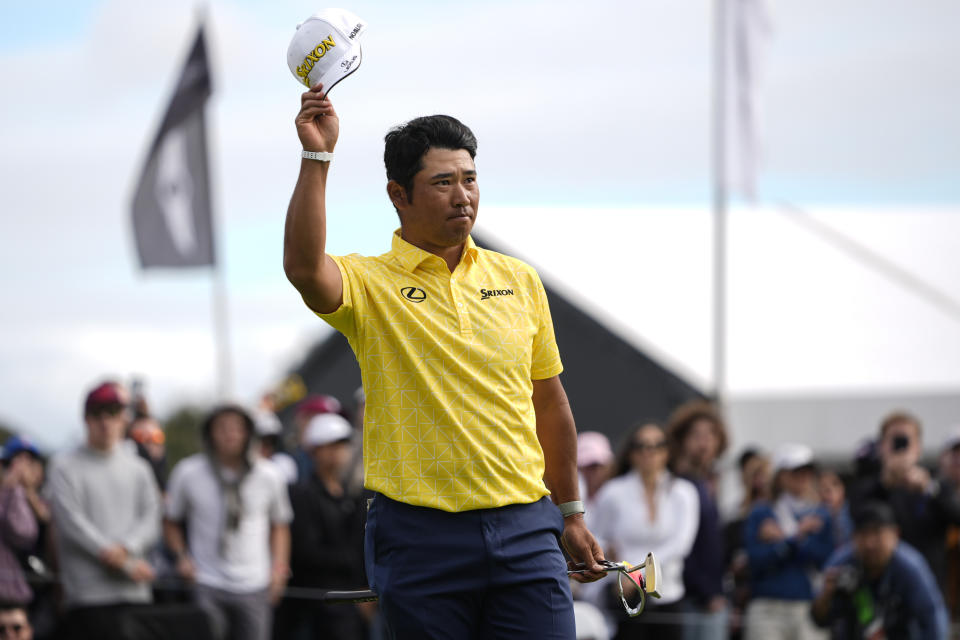 Hideki Matsuyama, of Japan, celebrates his win on the 18th green during the final round of the Genesis Invitational golf tournament at Riviera Country Club, Sunday, Feb. 18, 2024, in the Pacific Palisades area of, Los Angeles. (AP Photo/Ryan Sun)