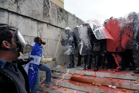 Protesters clash with police officers during a demonstration against the agreement reached by Greece and Macedonia to resolve a dispute over the former Yugoslav republic's name, in Athens, Greece, January 20, 2019. REUTERS/Alexandros Avramidis