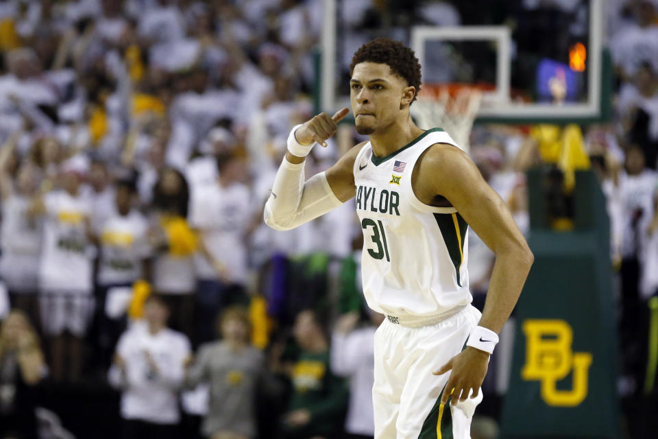 Baylor guard MaCio Teague gestures after a made basket against Kansas during the second half of an NCAA college basketball game on Saturday, Feb. 22, 2020, in Waco, Texas. (AP Photo/Ray Carlin)