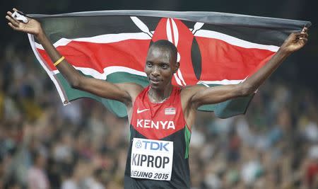 Asbel Kiprop of Kenya reacts after winning the men's 1500m event during the 15th IAAF World Championships at the National Stadium in Beijing, China August 30, 2015. REUTERS/Lucy Nicholson