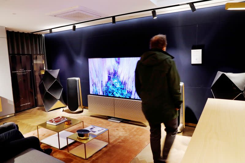 FILE PHOTO: A man looks on in the Bang & Olufsen flagship store in Copenhagen